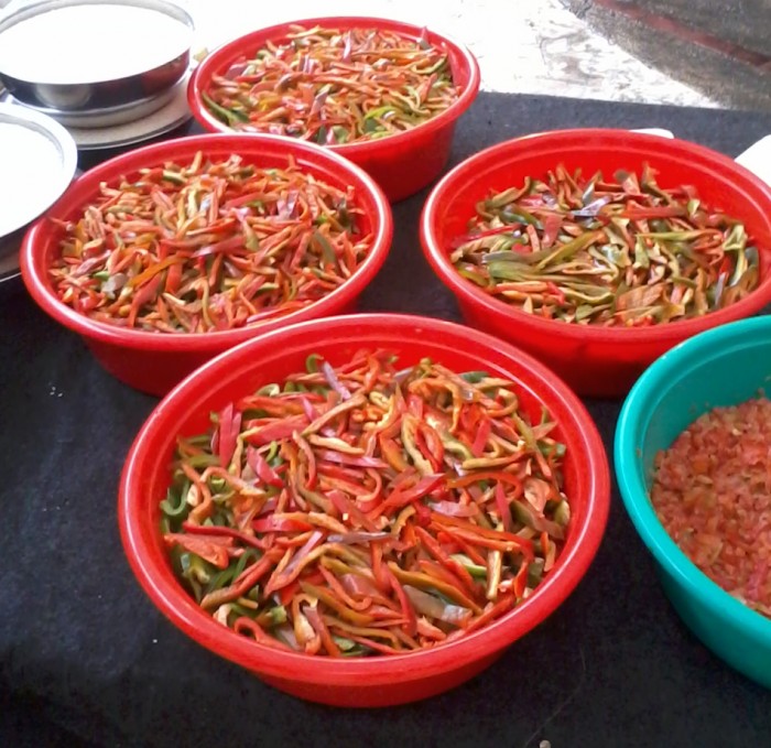 Red and green peppers to bring color and flavor to the paella. Photo by Claire Algarme. 