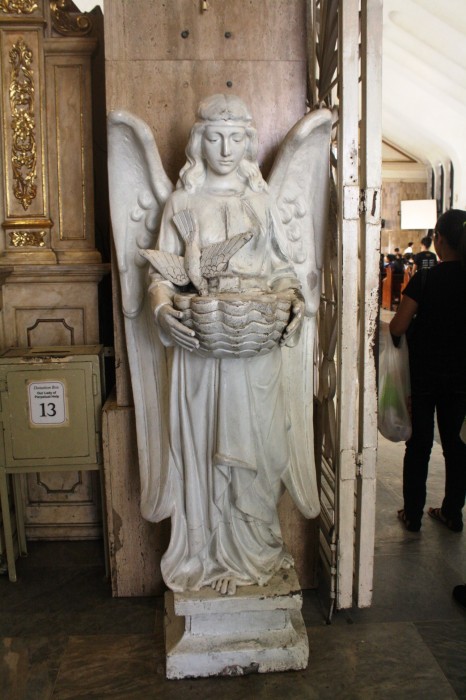 Angel by the door.