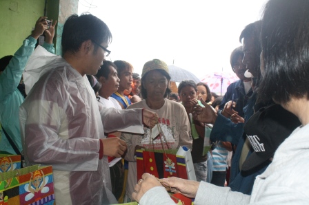 Mothers receive their kitchen utensils, umbrella and other items.