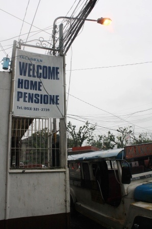 Welcome Home Pensione signage.