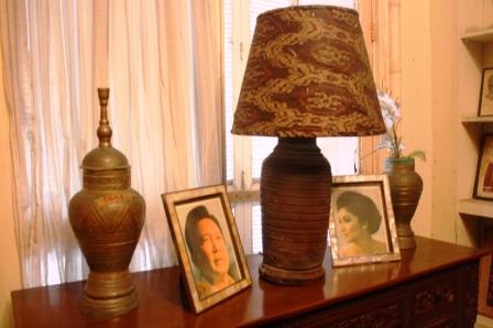 Photos of Ferdinand Marcos and of Imelda Marcos are displayed in each room.