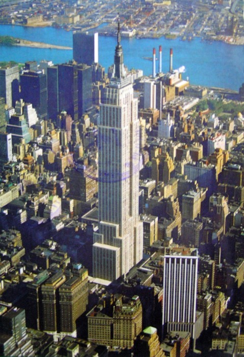 Skyscrapers and urban cities are frequently featured in US postcards.