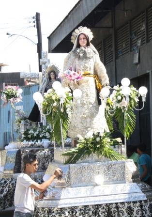 We pass by some parishioners getting ready for the procession.