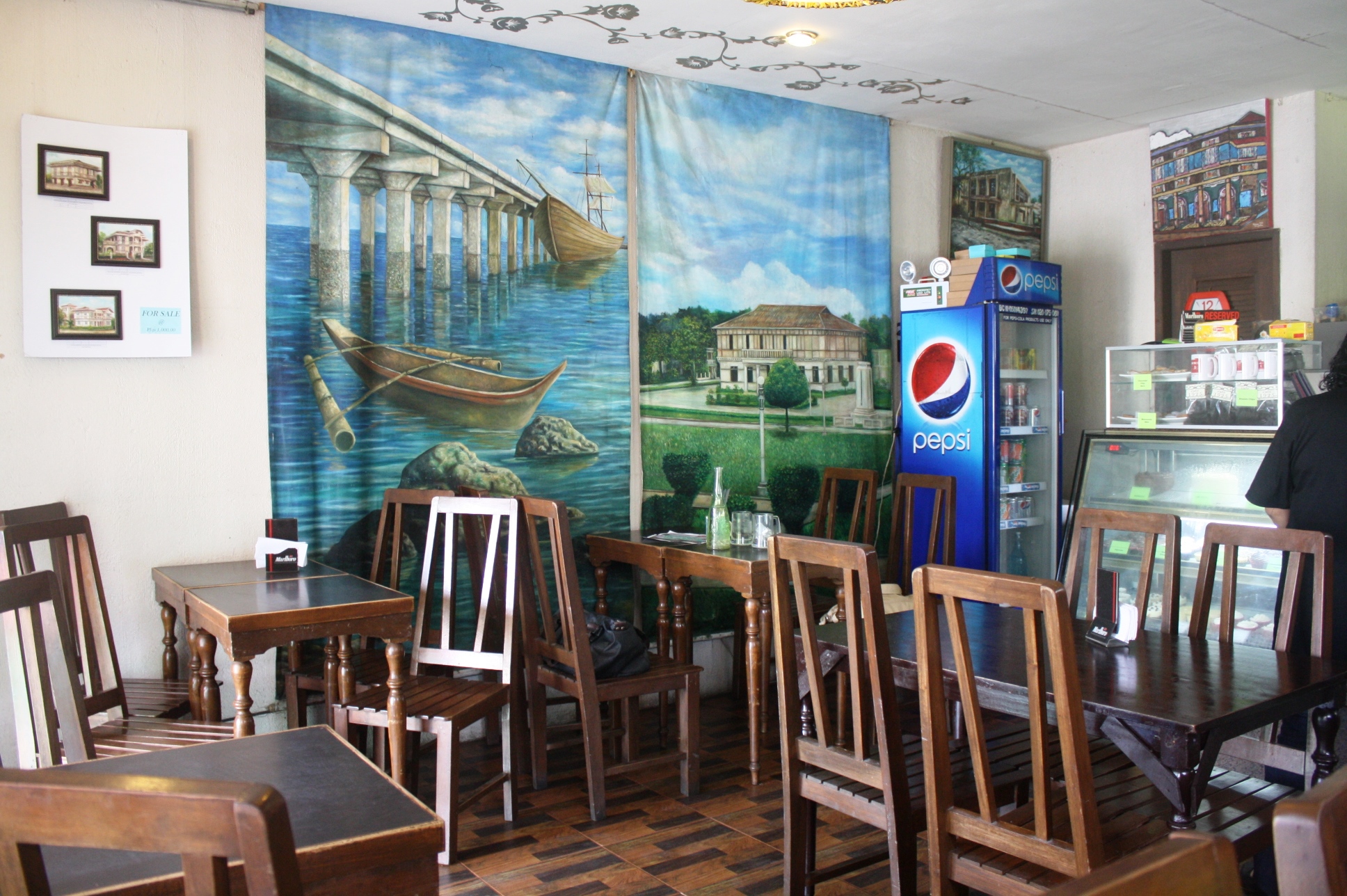 Paintings inside the cafe.
