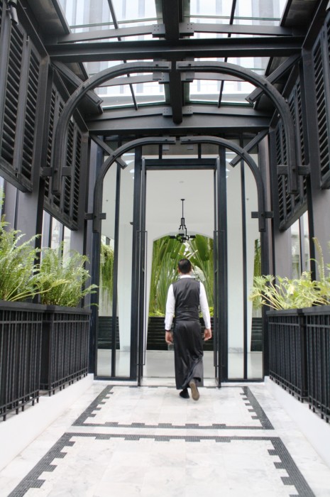 A staff leads us to our rooms.