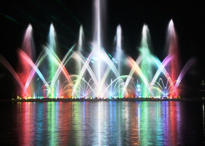 Colorful lights brightened the lake during the water fountain show.