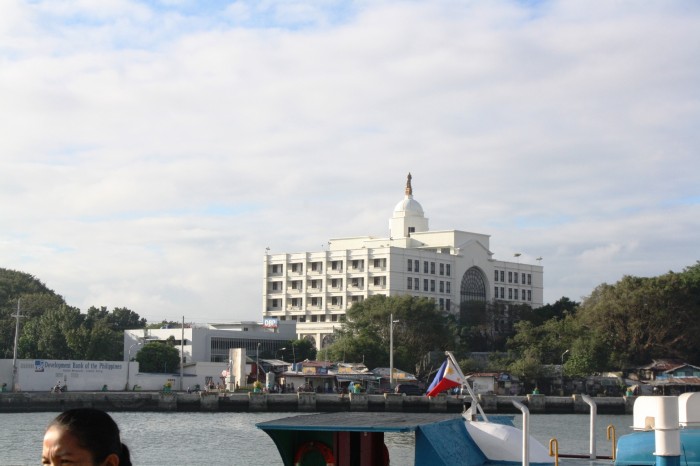 The city hall across the river.