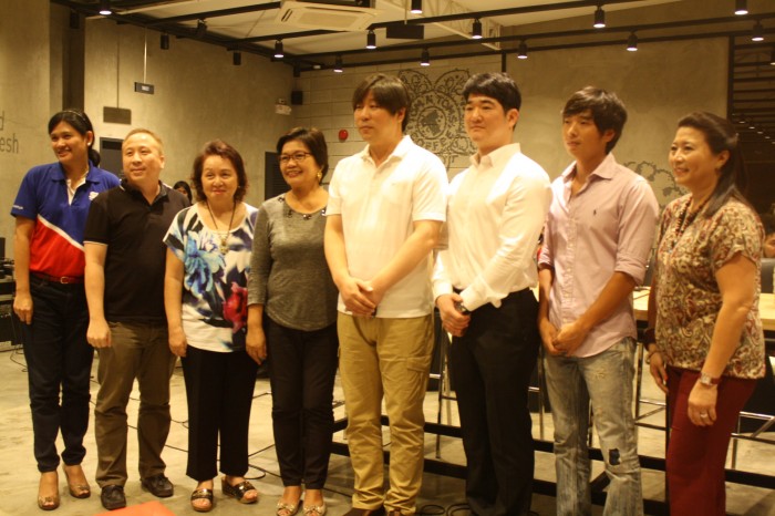 The Tom N Toms Coffee executives with Bacolod City first lady Paching Fuentebella (third from left) and guests.