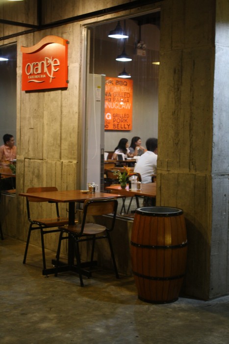Orange Karenderia has a clean, industrial look but has a spacious, friendly ambiance.