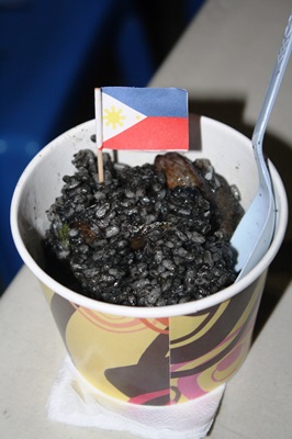 Paella Negra with a Philippine flag as we celebrated Independence Day.