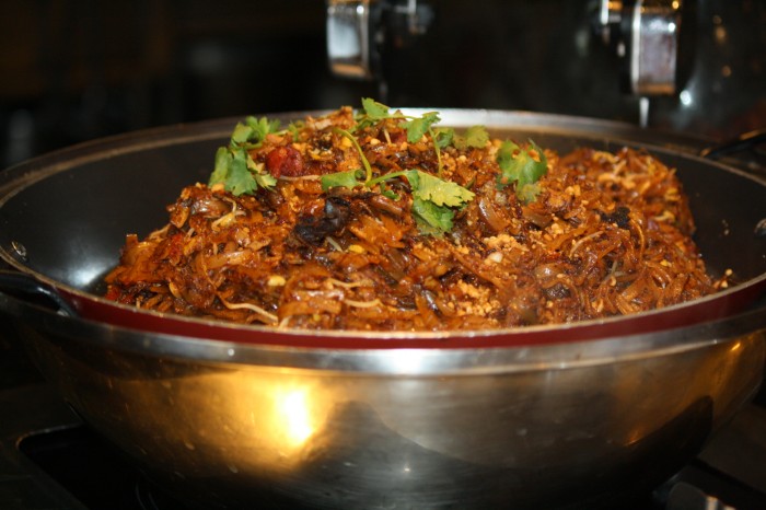 Char Kway Teow is Singaporean flat noodles.
